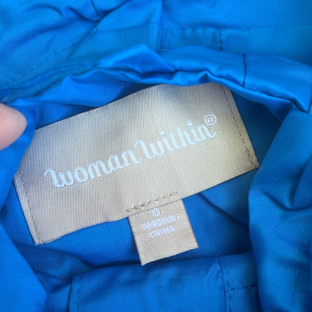 Woman Within Blue Rain Coat